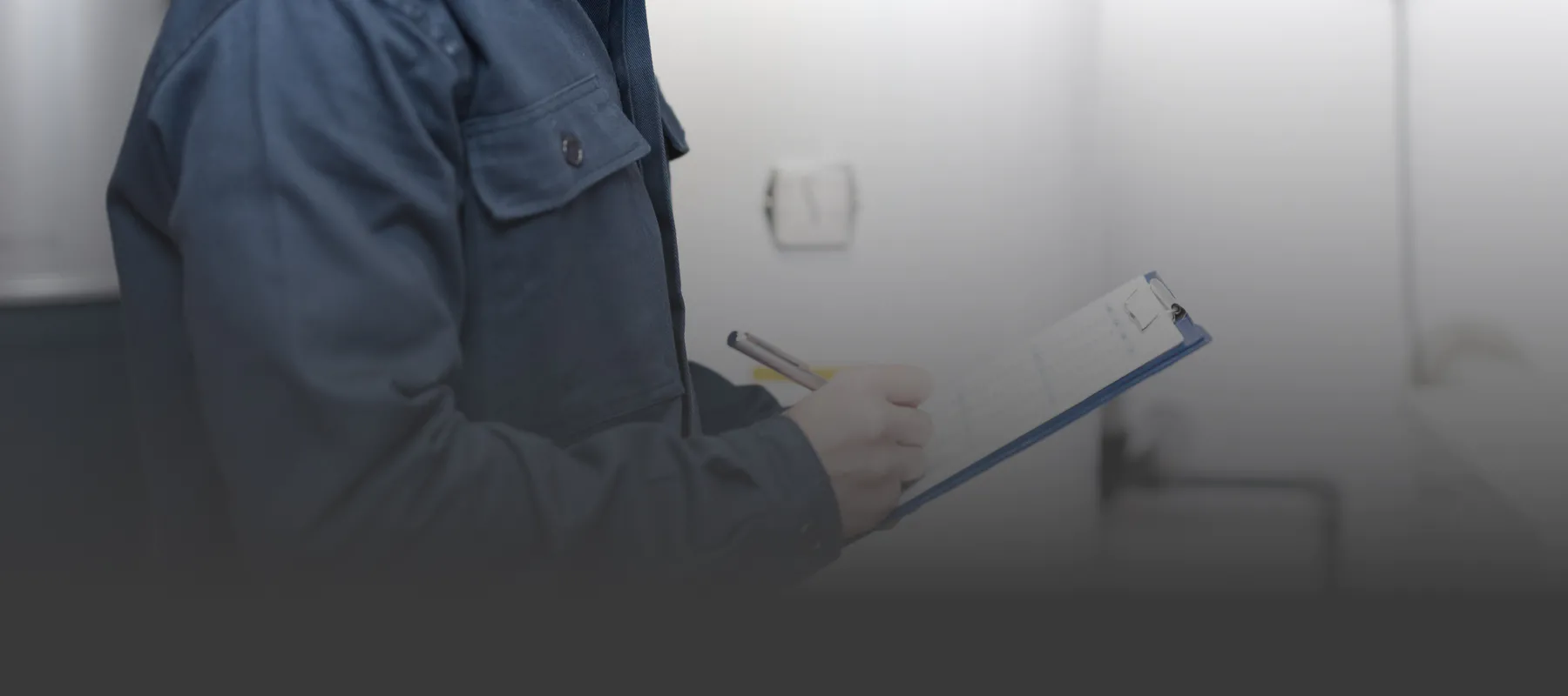 a home inspector using a clipboard austell ga